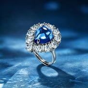 Deep Blue Teardrop Sunburst Zircon Ring